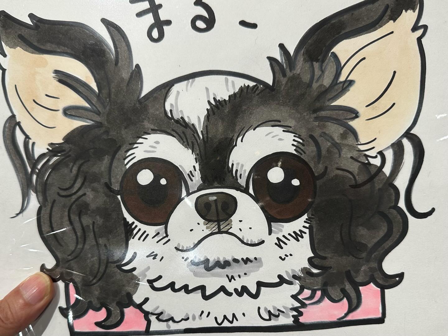 まる子の似顔絵を描いてもらった